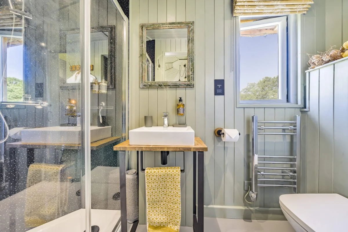 Ensuite with rainfall shower and luxury toiletries - Glamping Cabin Carmarthenshire with Hot Tub