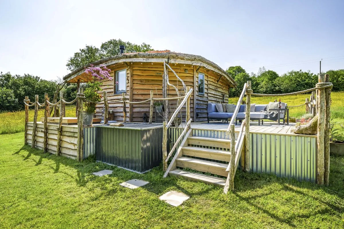 Erwain Escapes Cabin, rear view with steps to Alfresco Lounge Area. Luxury Glamping Cabin Carmarthenshire, West Wales