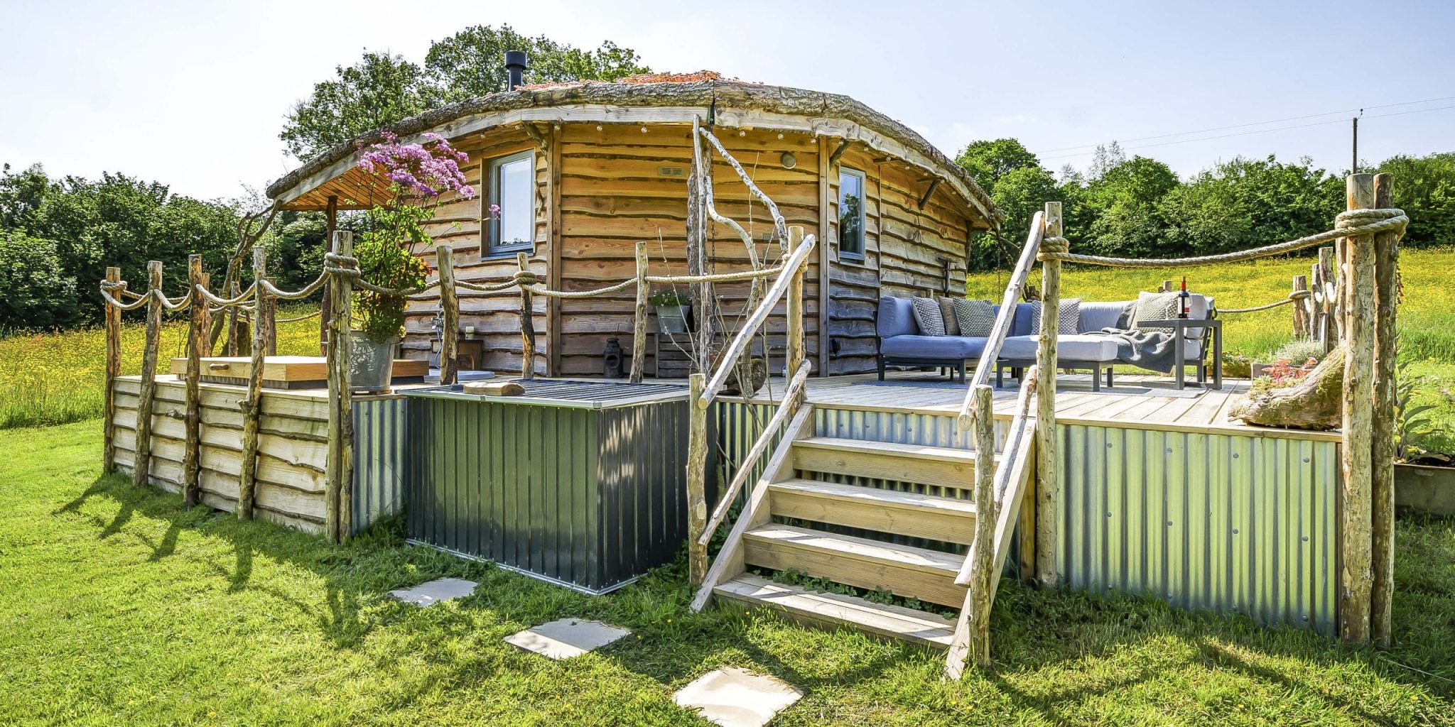 Erwain Escapes Cabin, rear view with steps to Alfresco Lounge Area. Luxury Glamping Cabin Carmarthenshire, West Wales
