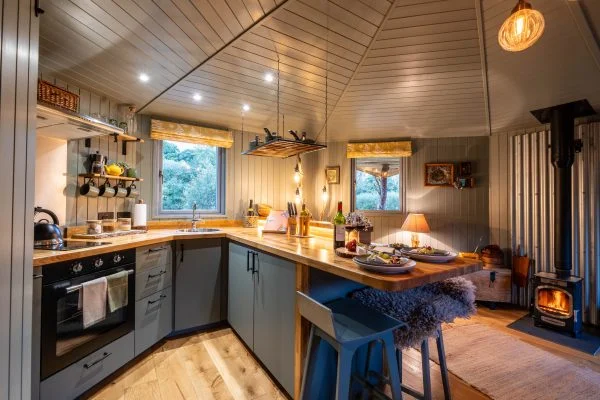 Open plan kitchen and relaxing lounge - Glamping Cabin Carmarthenshire with Hot Tub