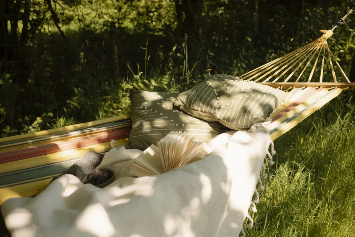 Relaxing in the Hammock by the river - Glamping Cabin Carmarthenshire with Hot Tub