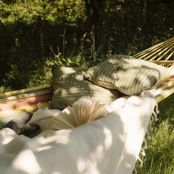 Relaxing in the Hammock by the river - Glamping Cabin Carmarthenshire with Hot Tub
