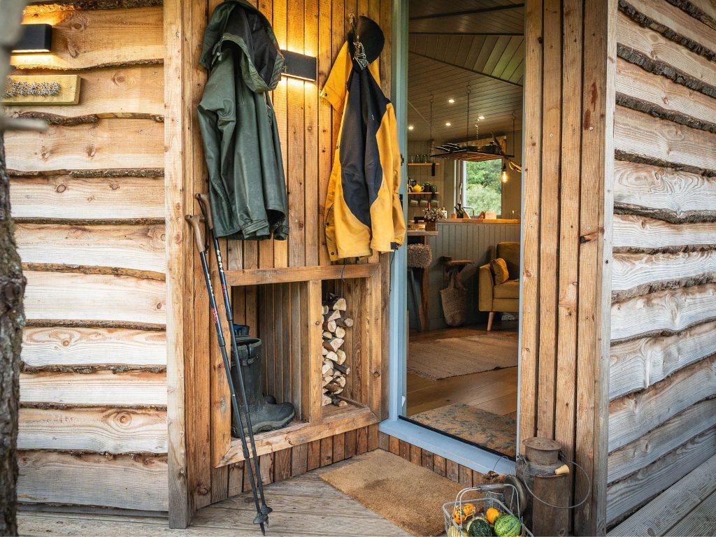 Walking-Boots-and-Jackets-in-the-Cabin-Porchway-at-Erwain-Escapes-Luxury-Glamping-near-the-Brecon-Brecons-Wale